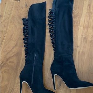 Sexy knee high boots, open straps in the back